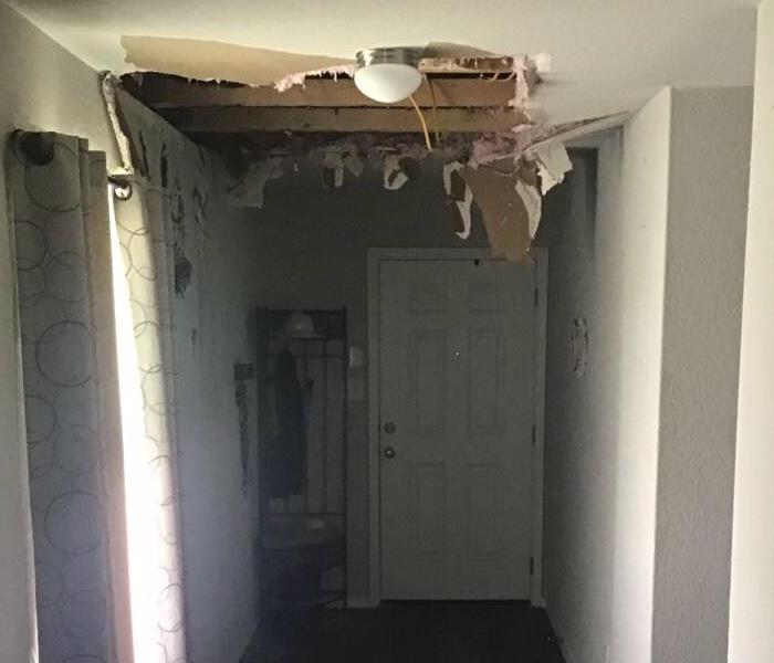 fire damage in an interior residential hallway