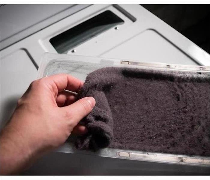 Remove the lint screen and clean it